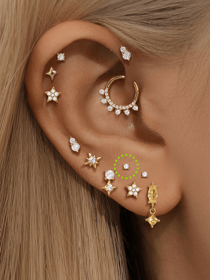 Isabella – Goldene Ohrringe mit sanfter, fließender Form.