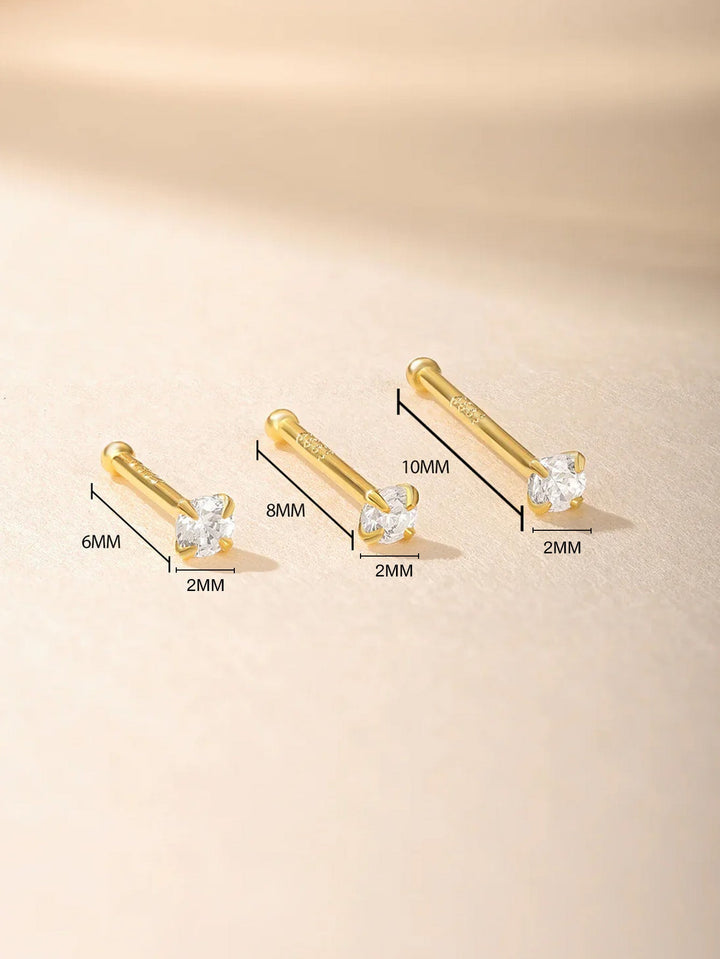 Isabella – Goldene Ohrringe mit sanfter, fließender Form.