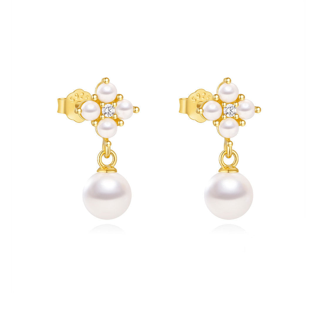 Viktoria – Zarte goldene Ohrringe mit delikatem Glanz.