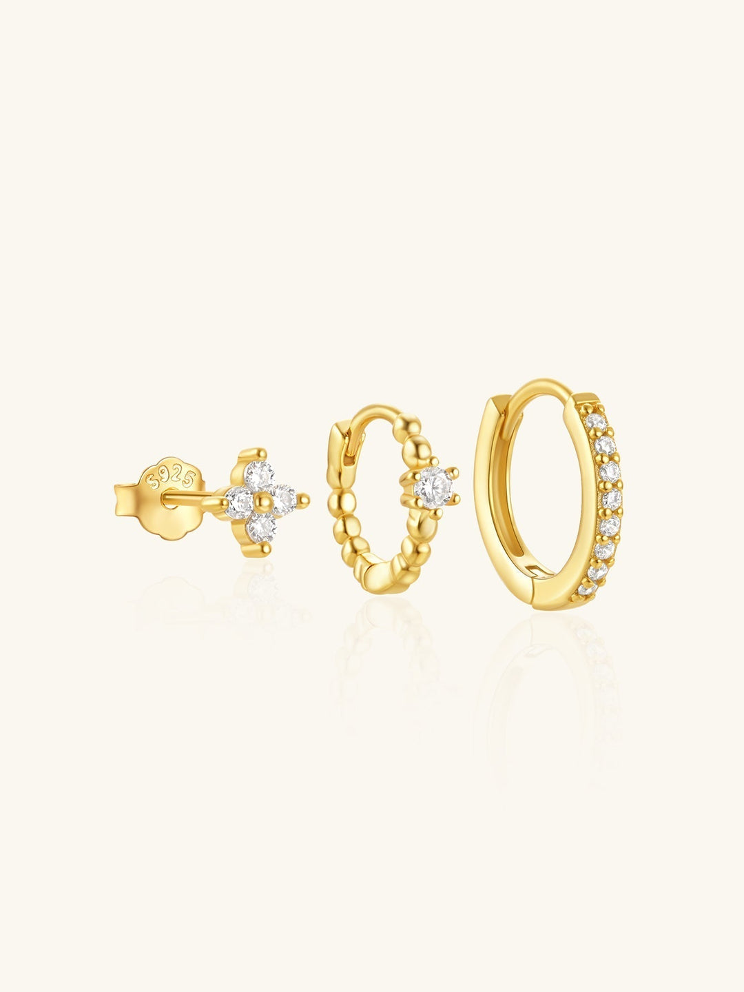 Luisa – Goldene Ohrringe mit weiblicher Form.