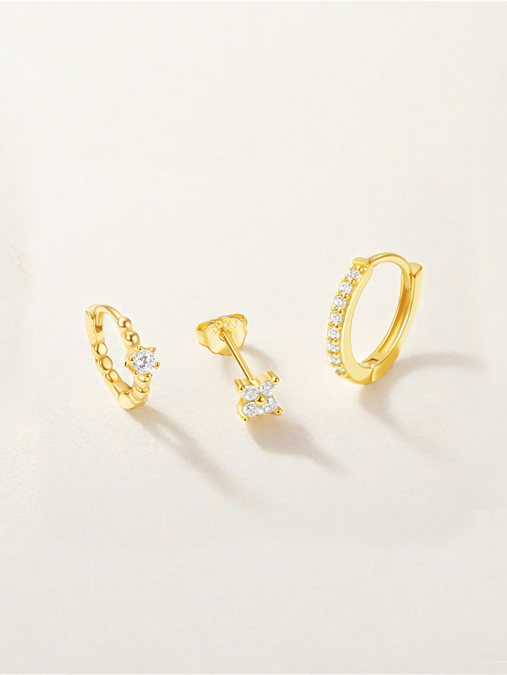 Luisa – Goldene Ohrringe mit weiblicher Form.