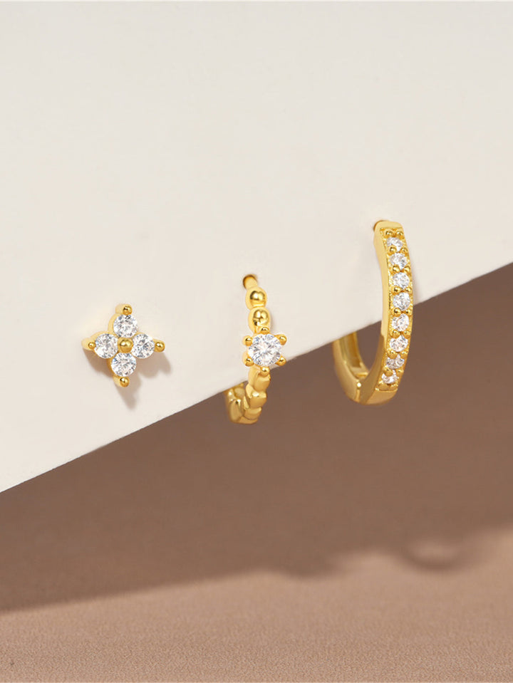 Luisa – Goldene Ohrringe mit weiblicher Form.