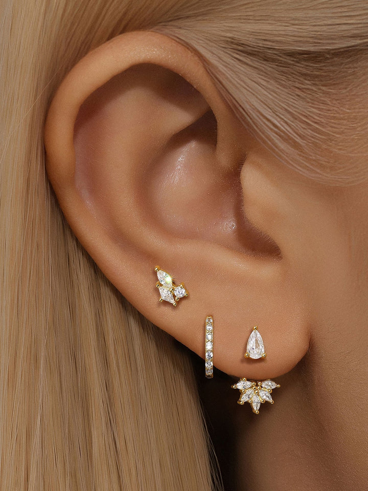 Magda – Zarte goldene Ohrringe mit sanftem Glanz.