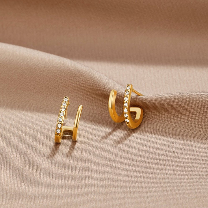 Sabine – Goldene Ringe mit geometrischem Twist.