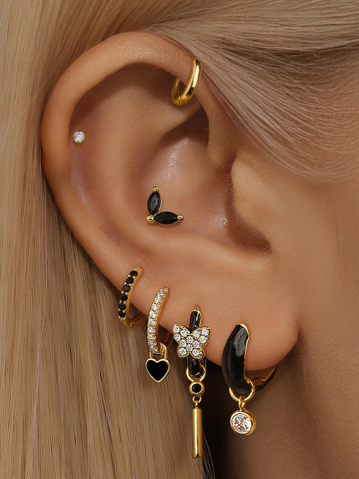 Theresia – Goldene Ohrringe mit sanfter Krümmung.