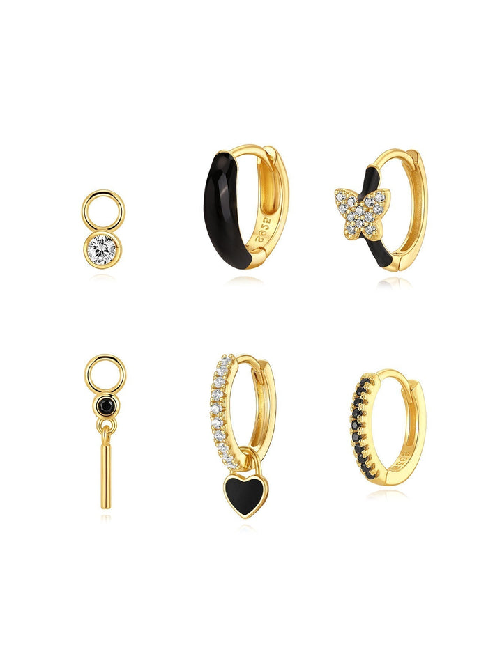 Theresia – Goldene Ohrringe mit sanfter Krümmung.