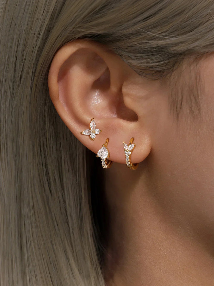 Eva-Marie – Zarte goldene Ohrringe in geschwungener Form.