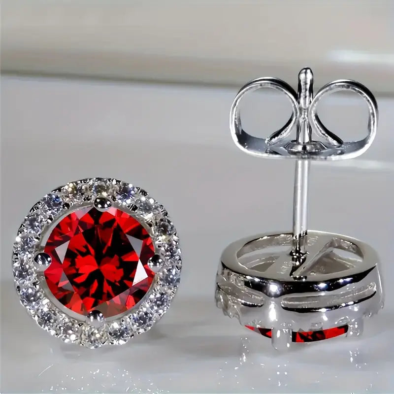 Luisa – Rubin-Ohrhänger im Sonnen-Design.