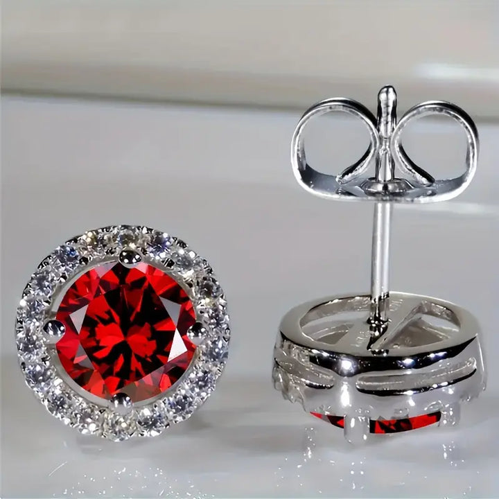 Luisa – Rubin-Ohrhänger im Sonnen-Design.