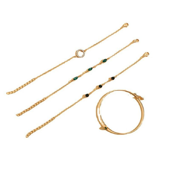 Marisa – Smaragdarmband im goldenen Rahmen.