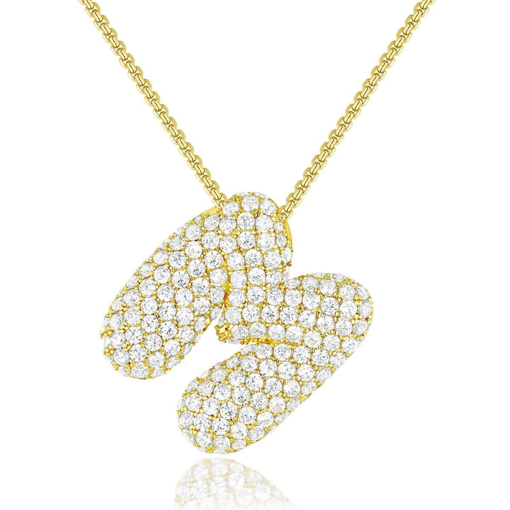 Frieda – Goldkette mit organischem Anhänger.