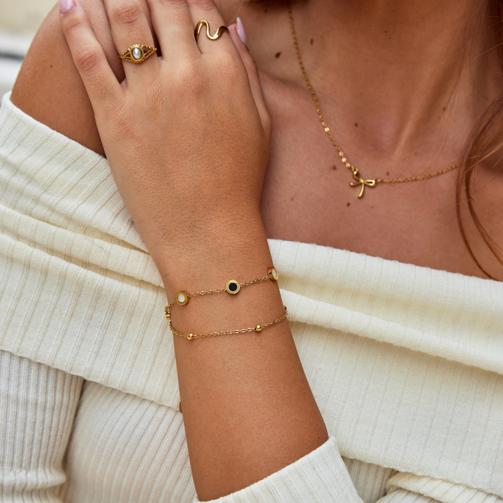 Armband aus Onyx und weißem Stein