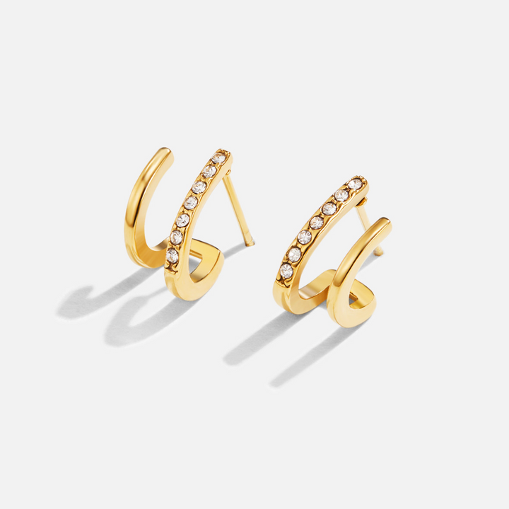 Sabine – Goldene Ringe mit geometrischem Twist.
